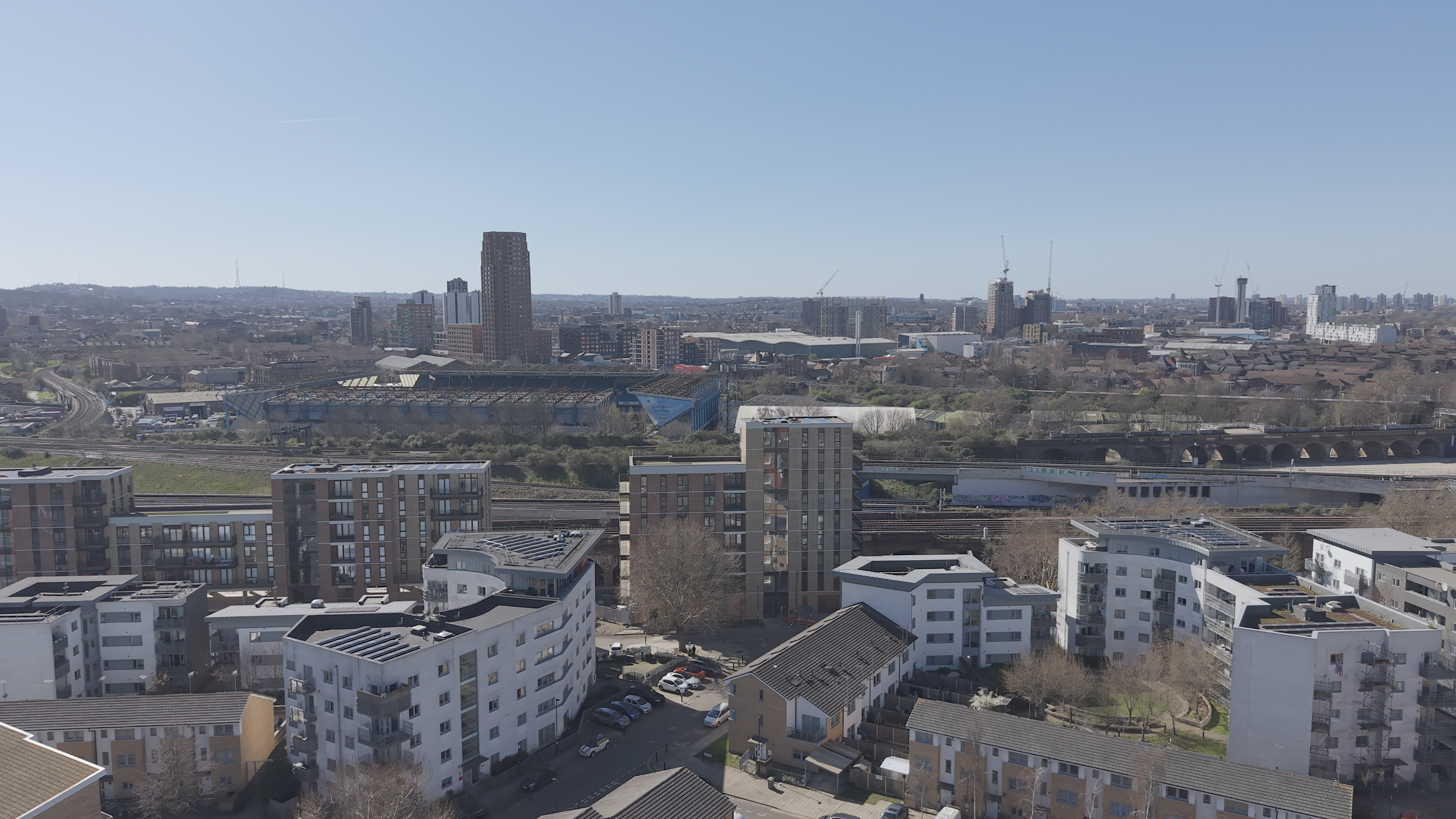 Aerial view of London Bridge area with a stadium and railway viaduct